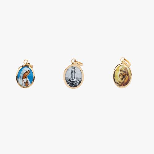 Medalha de ouro com Imagens de N. S.